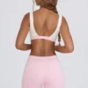 Pantaloni scurți mini cu volane în marl roz pal
