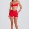 Pantaloni scurți mini Soft Active cu buzunare și talie în V, în culoarea roșu căpșună Pantaloni scurți mini Soft Active cu buzunare și talie în V, în culoarea roșu căpșună