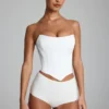 Pantaloni scurți Sabrine din jersey elastic, cu talie joasă, în culoarea albă Pantaloni scurți Sabrine din jersey elastic, cu talie joasă, în culoarea albă