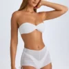 Pantaloni scurți transparenți cu volane Rocas, de culoare albă