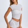 Pantaloni scurți transparenți cu volane Rocas, de culoare albă