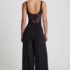 Pantaloni Zafira din jersey moale, cu talie medie și croi larg, în negru Pantaloni Zafira din jersey moale, cu talie medie și croi larg, în negru