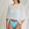 Poncho transparent Zarayah în alb Poncho transparent Zarayah în alb