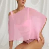 Poncho transparent Zarayah în roz bomboană Poncho transparent Zarayah în roz bomboană