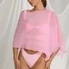 Poncho transparent Zarayah în roz bomboană Poncho transparent Zarayah în roz bomboană