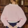 Pulover oversized din jersey de bumbac cu guler în V, în nuanța Powder Pink Pulover oversized din jersey de bumbac cu guler în V, în nuanța Powder Pink