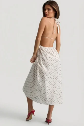 Rochie Aeris din poplin de bumbac, fără spate, lungime medie, cu imprimeu de trandafiri Rochie Aeris din poplin de bumbac, fără spate, lungime medie, cu imprimeu de trandafiri
