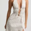 Rochie Aeris din poplin de bumbac, fără spate, lungime medie, cu imprimeu de trandafiri Rochie Aeris din poplin de bumbac, fără spate, lungime medie, cu imprimeu de trandafiri