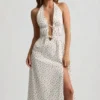 Rochie Aeris din poplin de bumbac, fără spate, lungime medie, cu imprimeu de trandafiri Rochie Aeris din poplin de bumbac, fără spate, lungime medie, cu imprimeu de trandafiri
