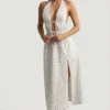 Rochie Aeris din poplin de bumbac, fără spate, lungime medie, cu imprimeu de trandafiri Rochie Aeris din poplin de bumbac, fără spate, lungime medie, cu imprimeu de trandafiri