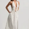 Rochie Aeris din poplin de bumbac, fără spate, lungime medie, cu imprimeu de trandafiri Rochie Aeris din poplin de bumbac, fără spate, lungime medie, cu imprimeu de trandafiri
