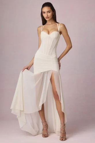 Rochie asimetrică cu corset și volane Haruna, culoare ivoriu Rochie asimetrică cu corset și volane Haruna, culoare ivoriu