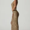 Rochie asimetrică cu decupaje și ornamente Persephone, în culoarea auriu Rochie asimetrică cu decupaje și ornamente Persephone, în culoarea auriu