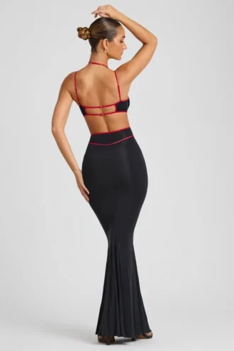 Rochie de seară Bella cu decupaje și borduri contrastante, în culoarea neagră Rochie de seară Bella cu decupaje și borduri contrastante, în culoarea neagră