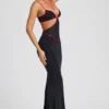Rochie de seară Bella cu decupaje și borduri contrastante, în culoarea neagră