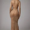 Rochie de seară Isabeau cu mâneci lungi, transparentă și decorată, în culoarea Almond Rochie de seară Isabeau cu mâneci lungi, transparentă și decorată, în culoarea Almond