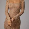 Rochie de seară Isabeau cu mâneci lungi, transparentă și decorată, în culoarea Almond Rochie de seară Isabeau cu mâneci lungi, transparentă și decorată, în culoarea Almond