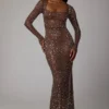 Rochie de seară Isabeau cu mâneci lungi, transparentă și decorată, în culoarea Deep Cocoa Rochie de seară Isabeau cu mâneci lungi, transparentă și decorată, în culoarea Deep Cocoa