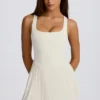 Rochie de tenis plisată cu spate decupat Soft Active în culoarea Ivory
