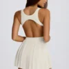 Rochie de tenis plisată cu spate decupat Soft Active în culoarea Ivory