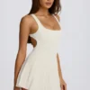 Rochie de tenis plisată cu spate decupat Soft Active în culoarea Ivory
