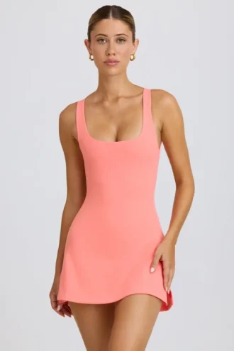 Rochie de tenis Soft Active cu spate decupat, culoare coral Rochie de tenis Soft Active cu spate decupat, culoare coral