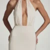 Rochie lungă Desiree cu spate decupat, gât halter și croi în formă de coadă de pește, în culoarea ivoriu