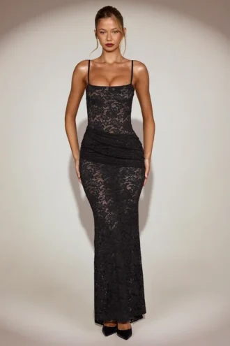 Rochie lungă din dantelă transparentă cu decolteu pătrat și volane, model Wintra, culoare negru Rochie lungă din dantelă transparentă cu decolteu pătrat și volane, model Wintra, culoare negru