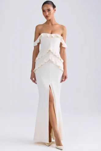Rochie lungă Hemera cu umeri decupați și volane, de culoare ivoriu Rochie lungă Hemera cu umeri decupați și volane, de culoare ivoriu