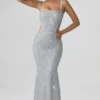 Rochie lungă Katalia cu decupaje și ornamente, argintie Rochie lungă Katalia cu decupaje și ornamente, argintie