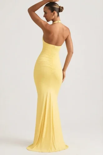 Rochie lungă Laverna cu decolteu în spate și volane, în galben pastel Rochie lungă Laverna cu decolteu în spate și volane, în galben pastel