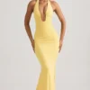 Rochie lungă Laverna cu decolteu în spate și volane, în galben pastel Rochie lungă Laverna cu decolteu în spate și volane, în galben pastel