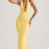 Rochie lungă Laverna cu decolteu în spate și volane, în galben pastel Rochie lungă Laverna cu decolteu în spate și volane, în galben pastel