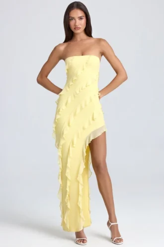 Rochie lungă Nevali cu volane și decolteu bandeau, în culoarea Lemon Sherbet Rochie lungă Nevali cu volane și decolteu bandeau, în culoarea Lemon Sherbet