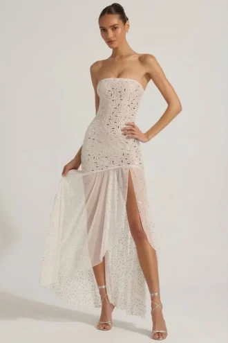 Rochie maxi asimetrică Kerra, semi-transparentă, cu ornamente, în culoarea albă