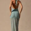 Rochie maxi Caicos cu decupaje și gât halter, verde spumă de mare