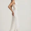 Rochie maxi corset cu decolteu adânc și volane, cu ornamente, model Nathalia, culoare ivoriu Rochie maxi corset cu decolteu adânc și volane, cu ornamente, model Nathalia, culoare ivoriu