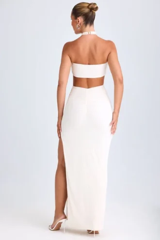 Rochie maxi cu decupaje și volane, cu gât halter, model Kalyani, în culoarea alb