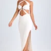 Rochie maxi cu decupaje și volane, cu gât halter, model Kalyani, în culoarea alb Rochie maxi cu decupaje și volane, cu gât halter, model Kalyani, în culoarea alb