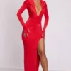 Rochie maxi cu mâneci lungi și glugă Desdemona, în culoarea roșu aprins Rochie maxi cu mâneci lungi și glugă Desdemona, în culoarea roșu aprins