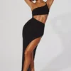 Rochie maxi Ishtar cu un umăr decupat, în culoarea neagră Rochie maxi Ishtar cu un umăr decupat, în culoarea neagră