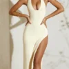 Rochie maxi Mei cu decolteu halter și fanta înaltă, culoare ivoriu Rochie maxi Mei cu decolteu halter și fanta înaltă, culoare ivoriu