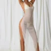 Rochie Maxi Pacifica cu decupaje și detalii din perle, în culoarea alb perlat Rochie Maxi Pacifica cu decupaje și detalii din perle, în culoarea alb perlat
