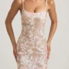 Rochie maxi Tavira cu decolteu rotund și spate decupat, decorată, în culoarea ivoriu Rochie maxi Tavira cu decolteu rotund și spate decupat, decorată, în culoarea ivoriu