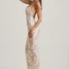 Rochie maxi Tavira cu decolteu rotund și spate decupat, decorată, în culoarea ivoriu Rochie maxi Tavira cu decolteu rotund și spate decupat, decorată, în culoarea ivoriu
