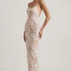 Rochie maxi Tavira cu decolteu rotund și spate decupat, decorată, în culoarea ivoriu Rochie maxi Tavira cu decolteu rotund și spate decupat, decorată, în culoarea ivoriu