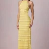 Rochie maxi Tove cu volane, decolteu în spate și gât halter, în galben lămâie Rochie maxi Tove cu volane, decolteu în spate și gât halter, în galben lămâie
