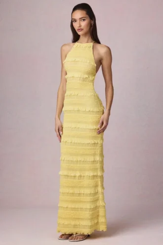 Rochie maxi Tove cu volane, decolteu în spate și gât halter, în galben lămâie Rochie maxi Tove cu volane, decolteu în spate și gât halter, în galben lămâie