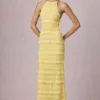 Rochie maxi Tove cu volane, decolteu în spate și gât halter, în galben lămâie Rochie maxi Tove cu volane, decolteu în spate și gât halter, în galben lămâie