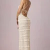 Rochie maxi Tove cu volane, fără spate și cu gât halter, în culoarea Ivory Rochie maxi Tove cu volane, fără spate și cu gât halter, în culoarea Ivory